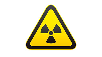 znak ostrzegawczy o promieniowaniu